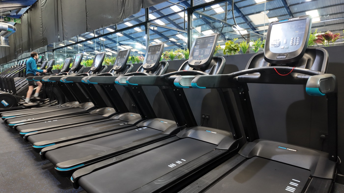 Row of treadmills in the cardio area